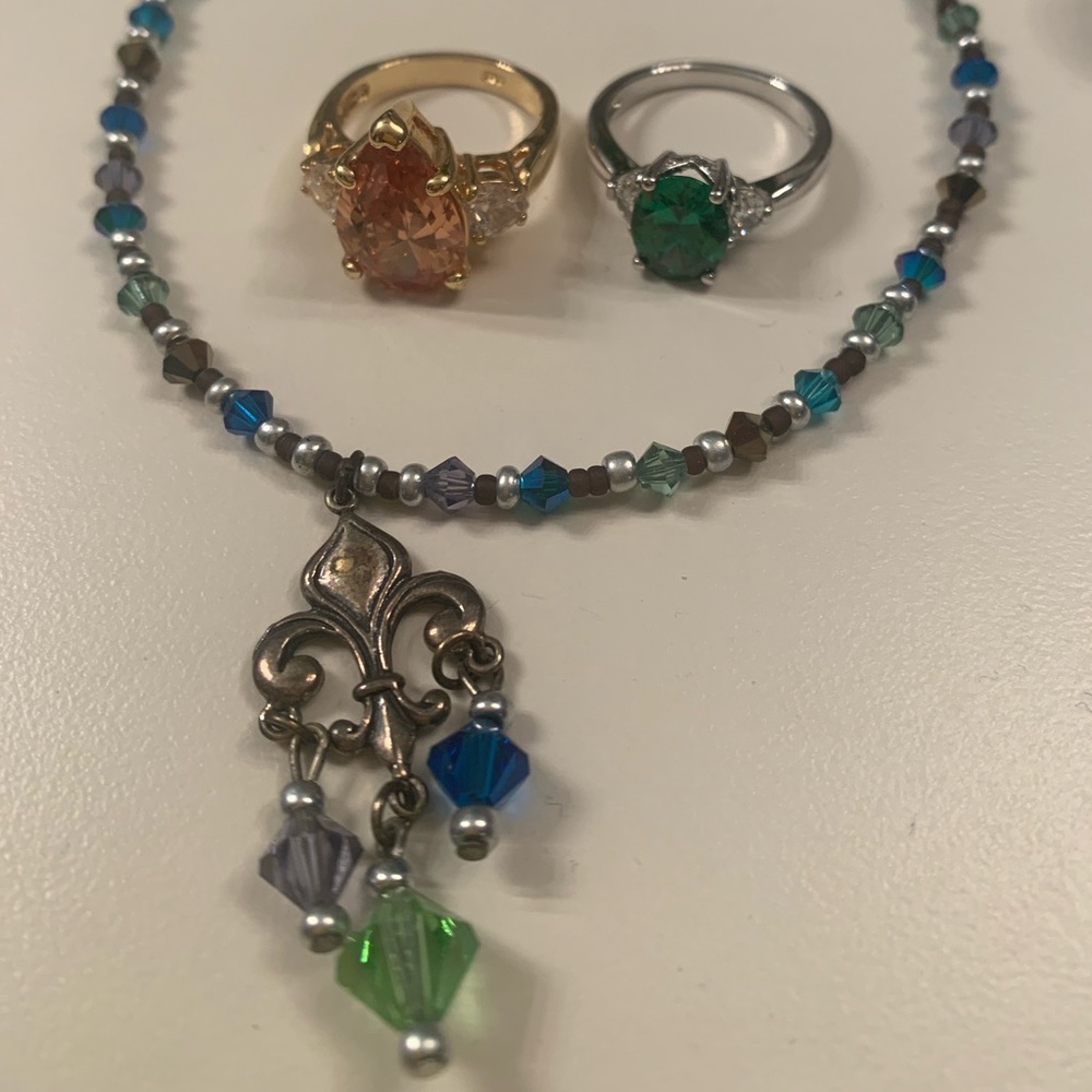 2 rings and a necklace